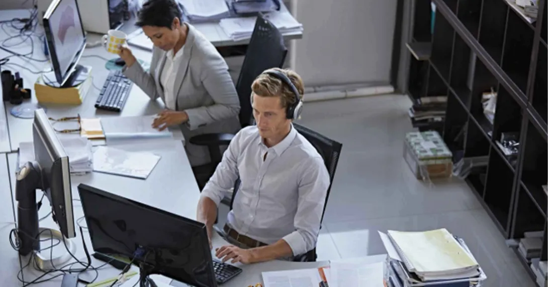 medical coding workers at desk